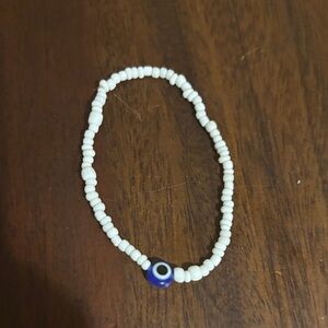 White Beaded Bracelet with Blue Accent